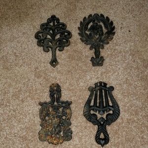 Antique miniature trivets. Used as wall decor